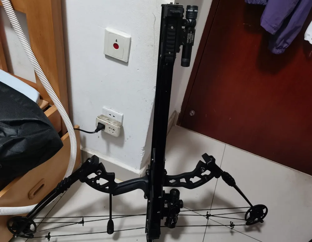 An indoor view highlighting the upright rail and compound bow layout.