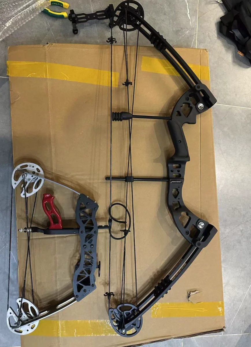 An overhead view of the black frame, cams and cable arrangement.